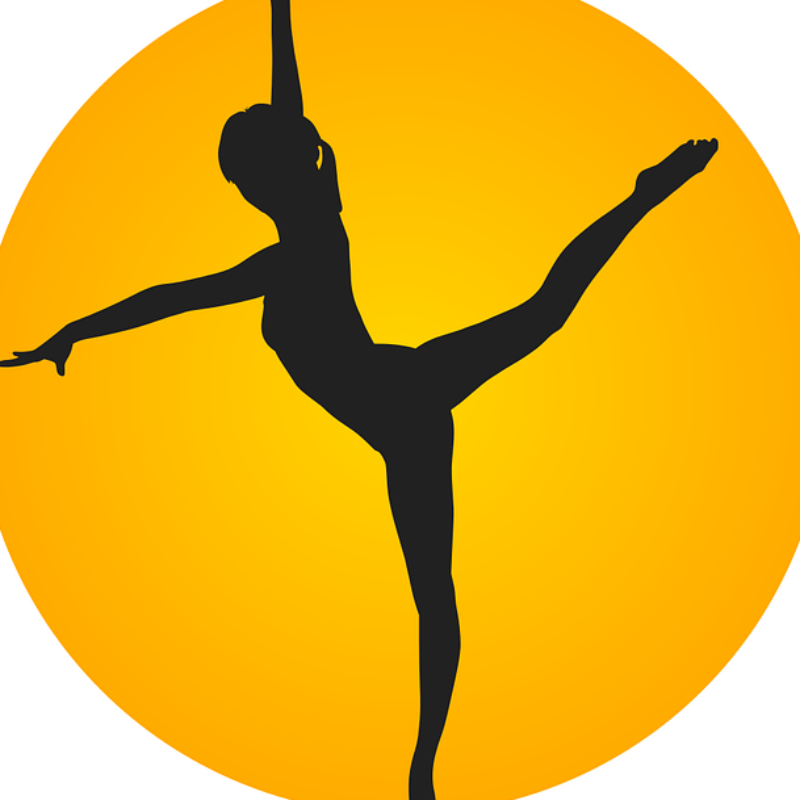 ombre d'une gymnaste sur fond jaune orangé